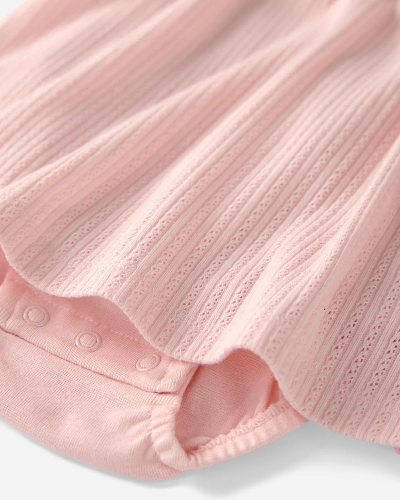 Vestido rosa tipo bodie en jacquard bebé niña